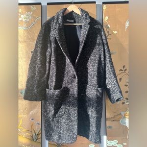 Oversized coat tweed look very chic on